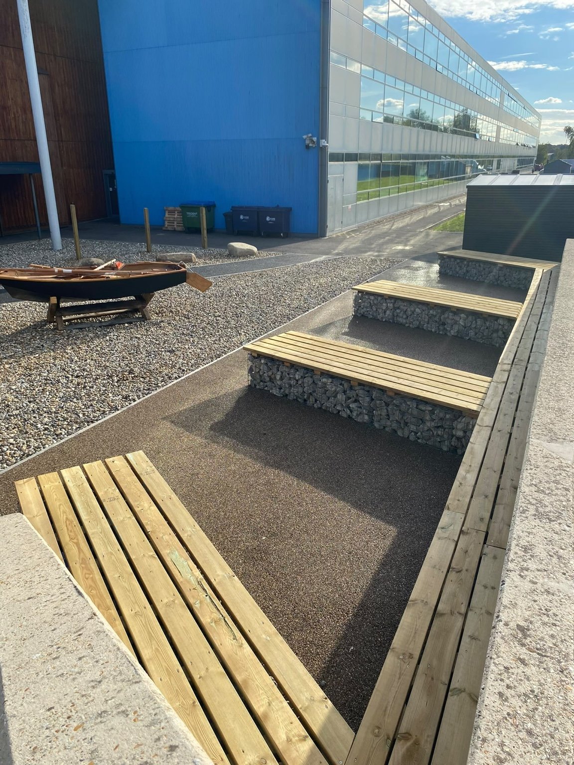 Kent ragstone gabion benches and boat feature at Folkestone Academy