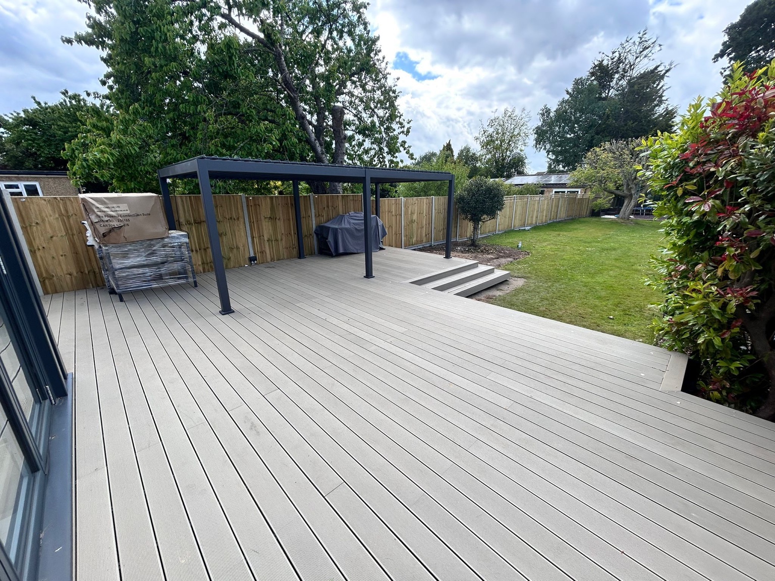A view along the decking towards the wider garden.