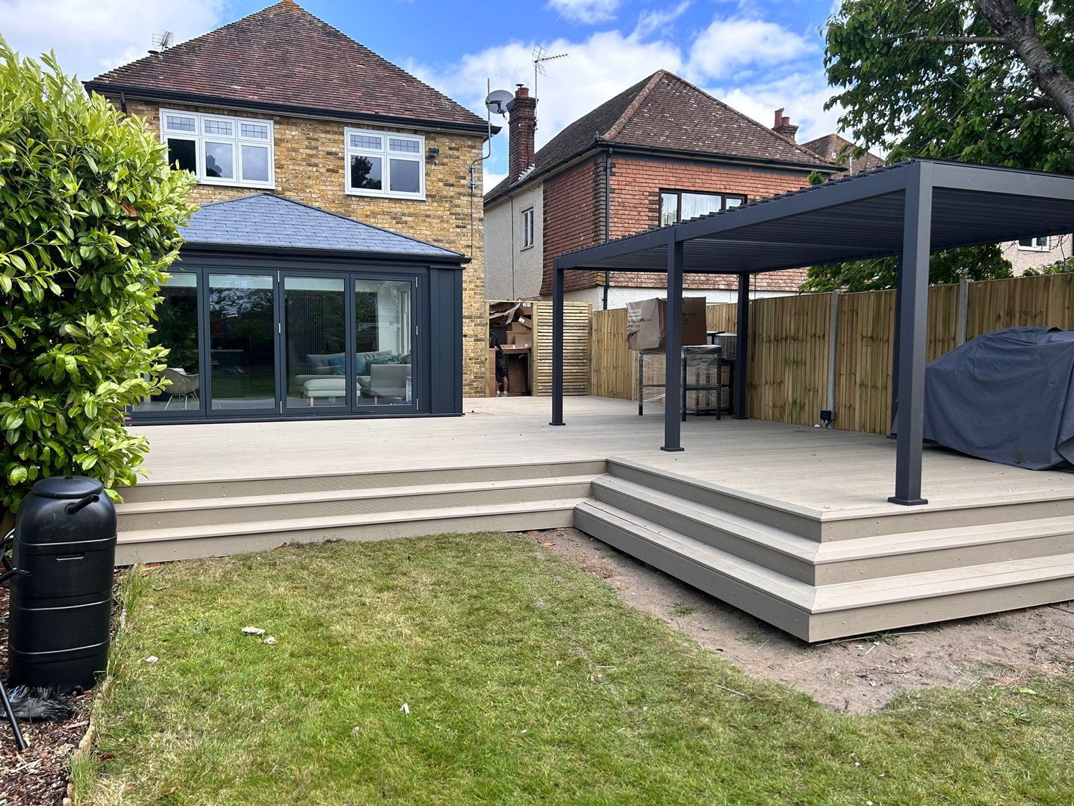 The stepped edge gives a clear transition between the deck and lawn.